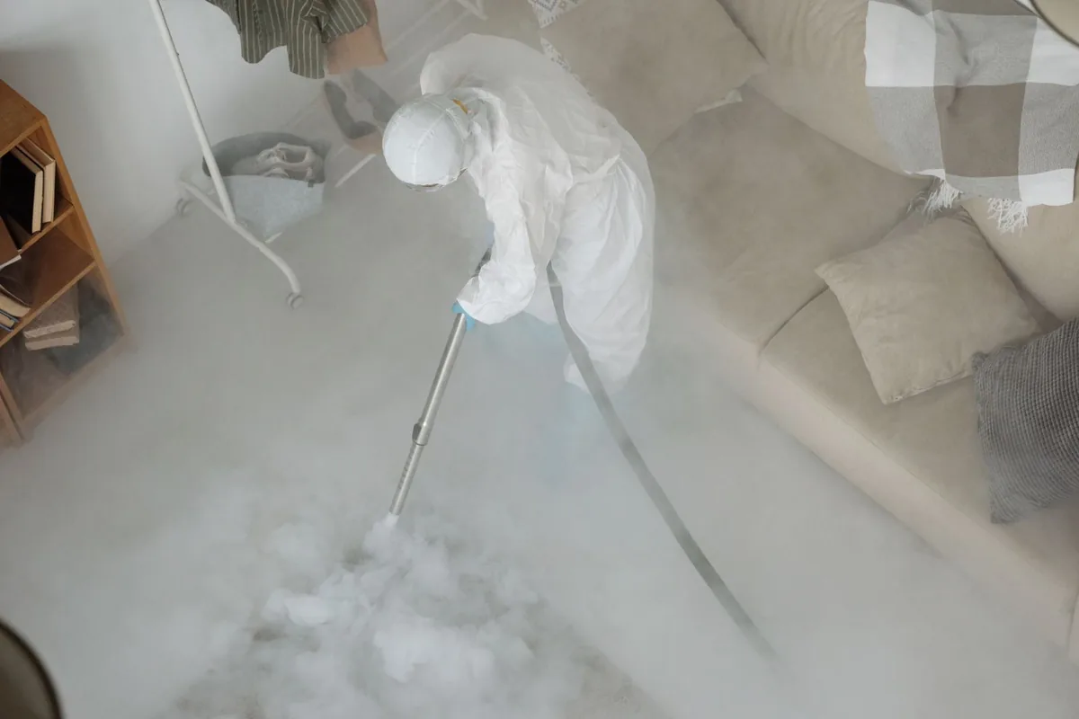 Biohazard cleanup technician in protective equipment, Estell Manor, NJ